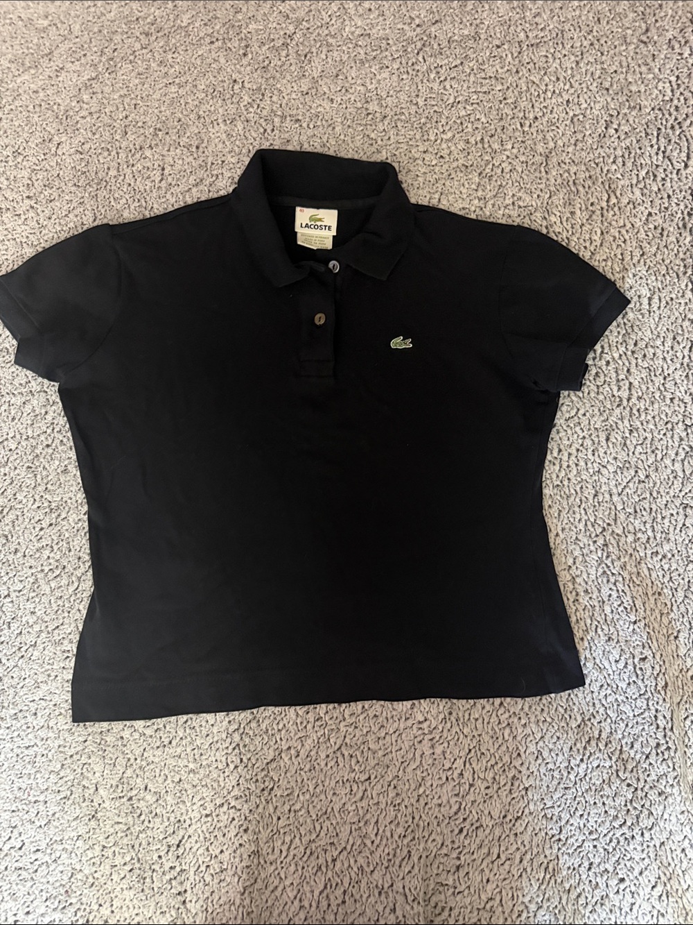 Women's black polo tee